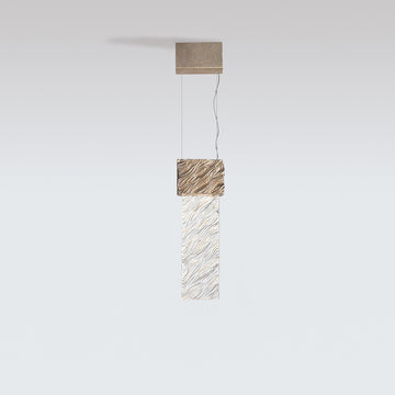 Modern pendant light with geometric design on a white background