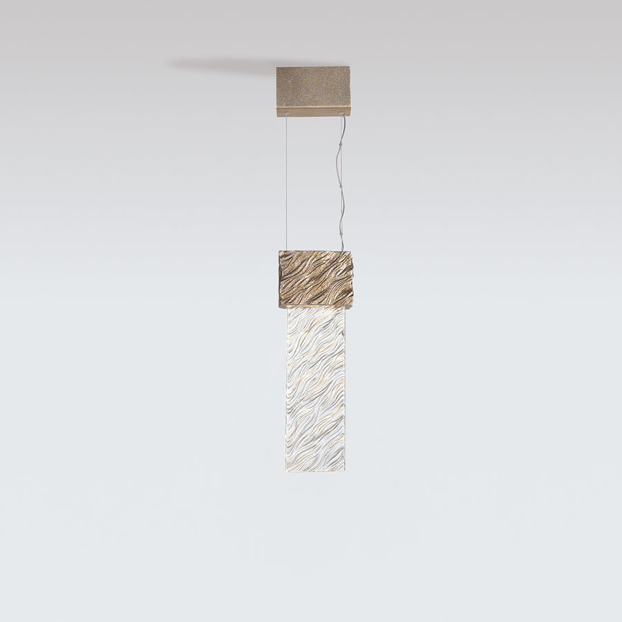 Modern pendant light with geometric design on a white background