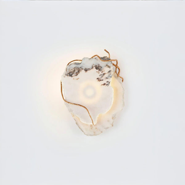 Decorative wall light with marble and gold metal finish accents on a white background
