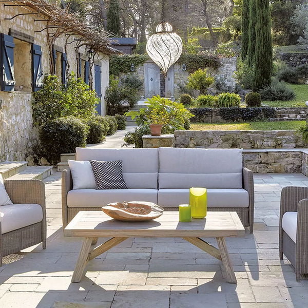 Sifas Coco collection of sofa seating with wooden coffee table at green exterior available at Spacio India for luxury home decor collection of Outdoor Furniture