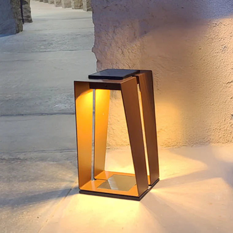 Modern outdoor lantern with solar panel on a stone pavement by Les Jardins available at Spacio retail stores in Mumbai & Kolkata. 