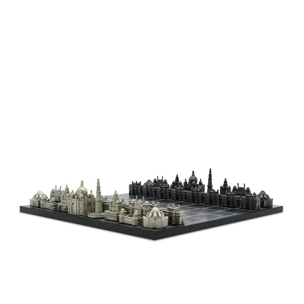 A India monument chess set, featuring detailed gray and black domed buildings on a dark base, photographed against a solid white background from Skyline, available at Spacio in India. 