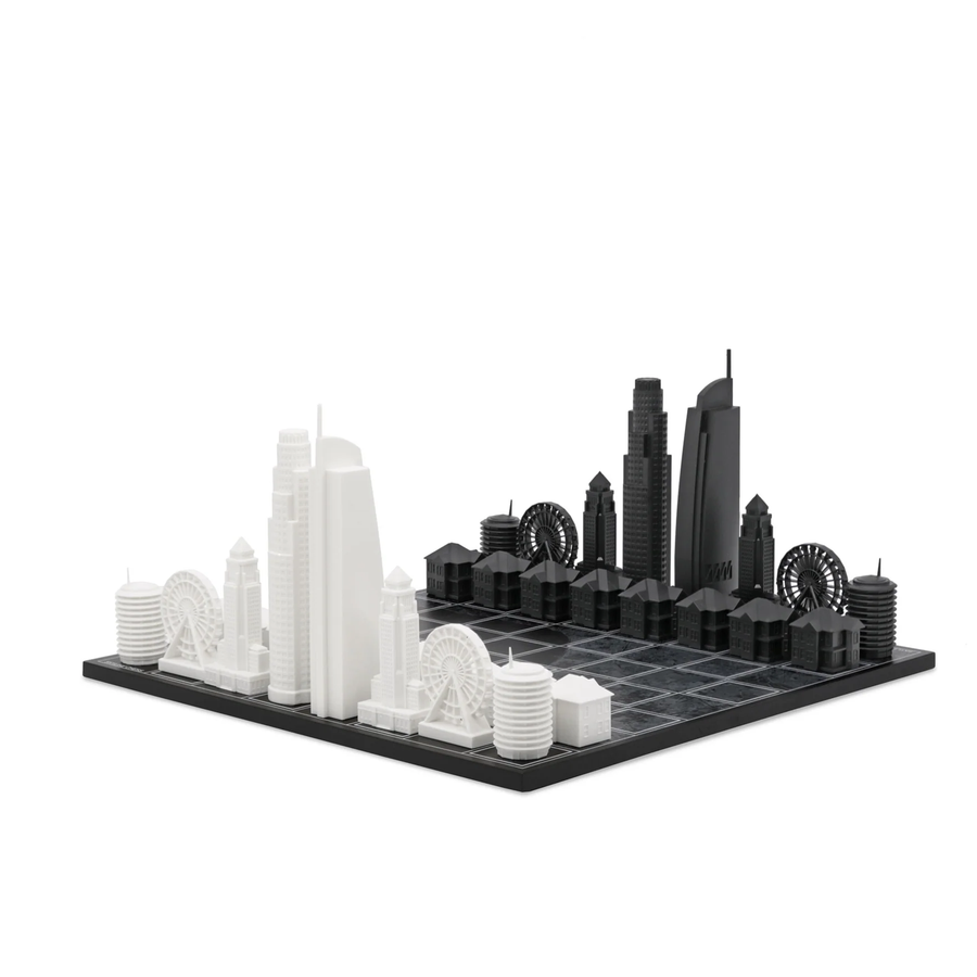 Skyline Chess Acrylic Los Angeles Map Board Set – A luxury chess set featuring iconic Los Angeles landmarks like the Capitol Records building, Santa Monica Pacific Wheel, City Hall, LA Bank Tower, and Wilshire Grand. Available at Spacio India.