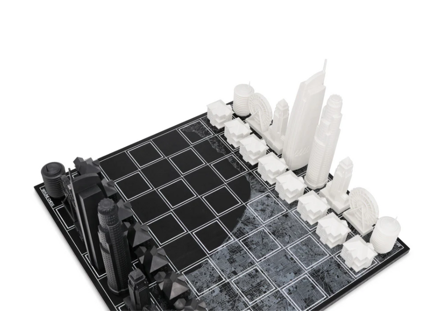 Black edition chess pieces from Skyline Chess Acrylic Los Angeles Map Board Set, featuring famous LA landmarks, available at Spacio India.