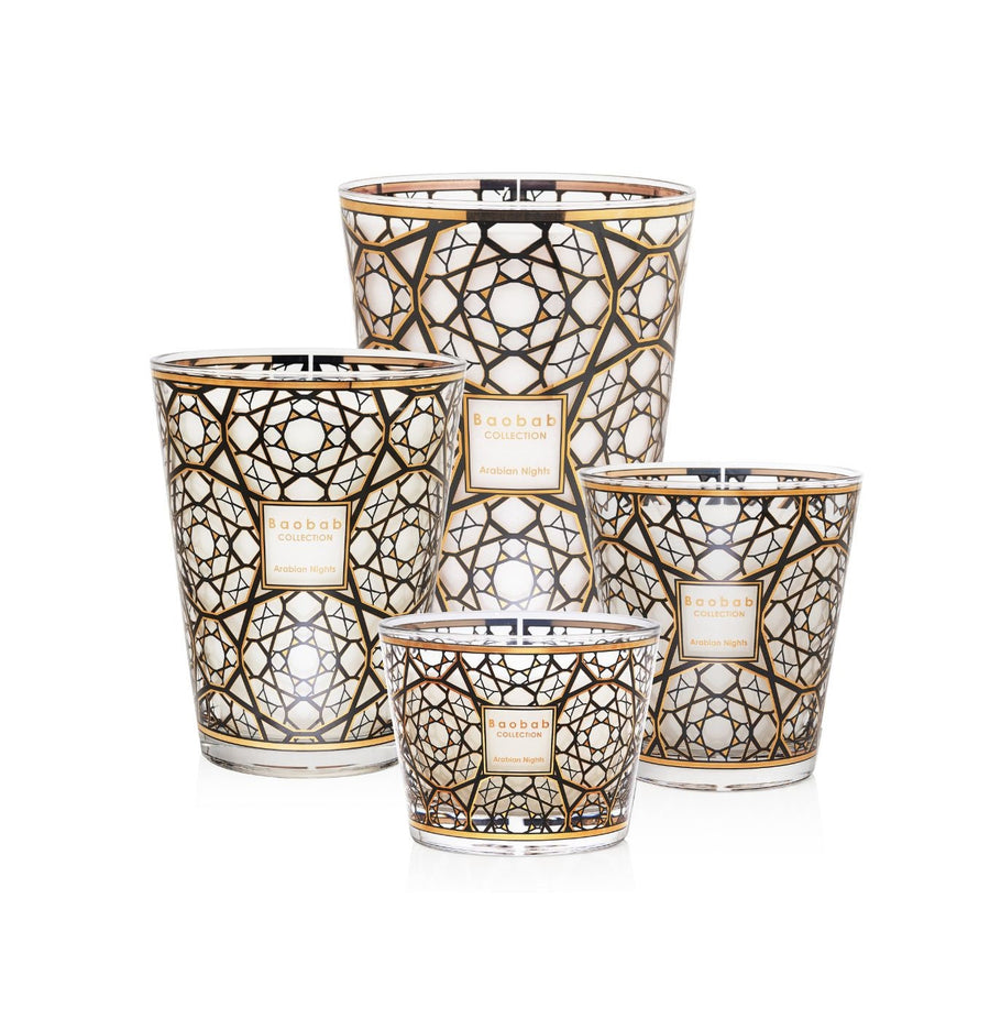 A set of Baobab Arabian Nights Candle MAX10ARN candle holders with gold and black designs inspired by Arabian Nights.