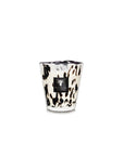 A Baobab Black Pearls Candle Max 16 MAX16PB, with a black and white print on it, perfect as a decoration or for creating an ambiance with its fragrance like Black Pearls.