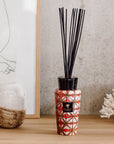 Baobab Boho Gyula Diffuser DIF500BGY with a floral fragrance sitting on a wooden table.