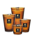 A group of Baobab Cuir De Russie candles scented with Cuir de Russie fragrance and adorned with a black lid.