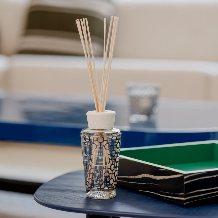 Baobab Gentlemen Diffuser 500ml DIF500GEN on a blue table in a living room.