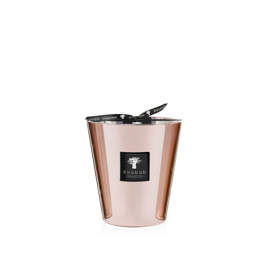 A Baobab Roseum Candle MAX16ROS with a rose gold hue and a black lid, exuding femininity.