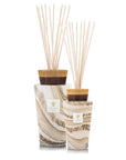 A pair of Baobab Sand Siloli 2L Diffuser Med TOTEMMSSI with wooden sticks, perfect for adding fragrance to your space.