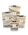 A set of Baobab Sand Siloli Candles with a marble pattern on them.