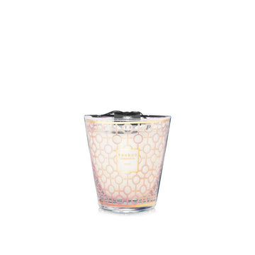 A Baobab Women Candle MAX16WOM in a glass with a pattern on it, supporting the Breast Cancer Foundation.