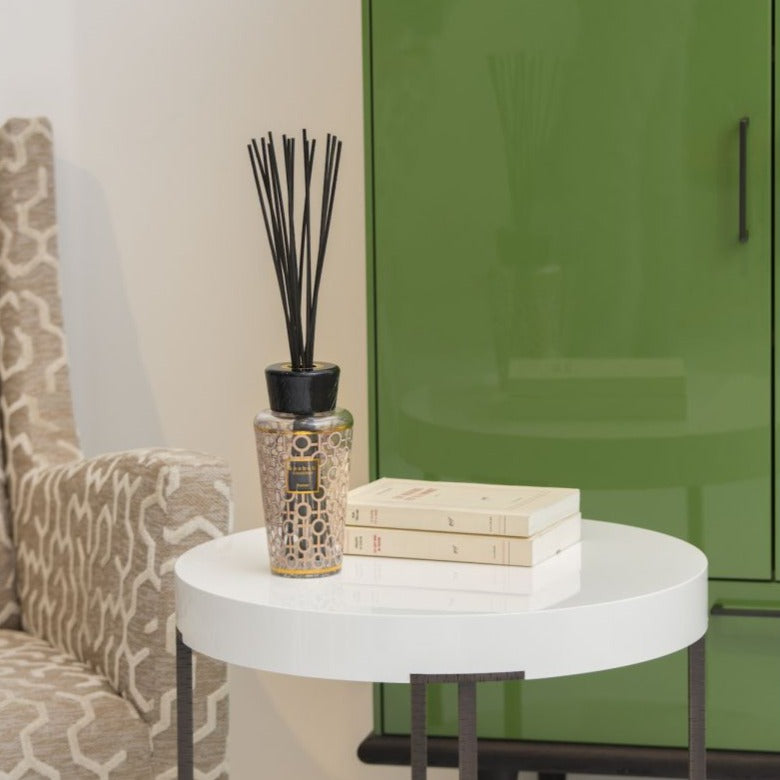 Baobab Women Diffuser 500ml DIF500WOM by Baobab on a table next to a green cabinet.