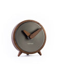 A minimalist Nomon Atomo Table T AMTN wooden clock on a white background.