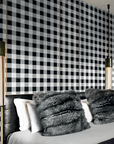 A bedroom with a Londonart Dsquared2 D2Jack DSQ2W02 wall inspired by Italian tailoring.