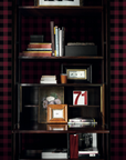 A bookcase with a black and red plaid wallpaper, showcasing the chic influence of Italian tailoring from luxury fashion brands like Londonart Dsquared2 D2Jack DSQ2W02 from Londonart.