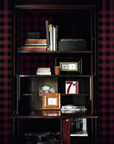 A bookcase with a black and red plaid wallpaper, showcasing the chic influence of Italian tailoring from luxury fashion brands like Londonart Dsquared2 D2Jack DSQ2W02 from Londonart.