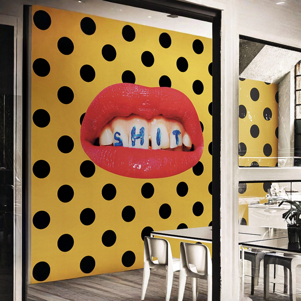 A luxury dining room with Londonart Toilet Paper Wash Your Mouth yellow and black polka dot wallpaper.