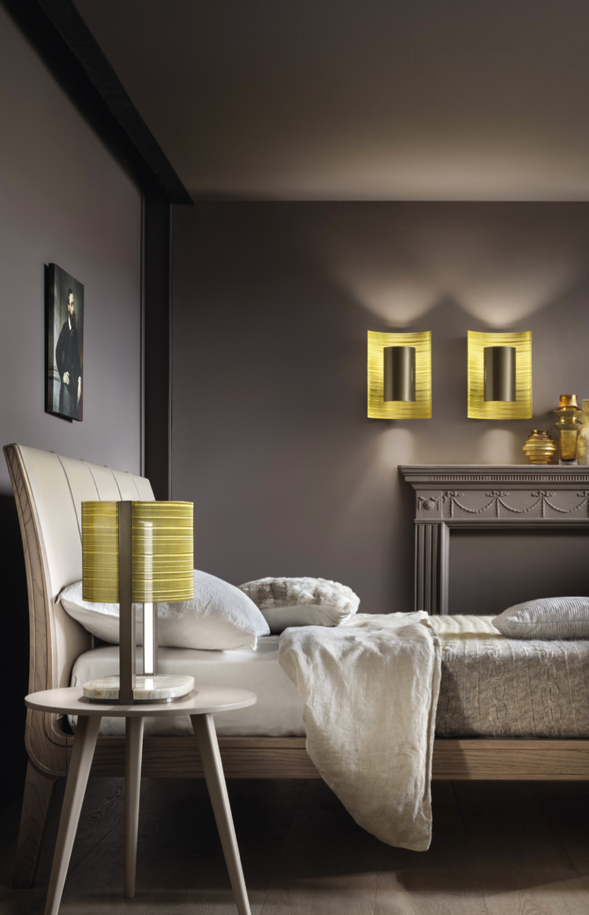 A bedroom with two Masiero Ebe Table Lamps, from the Masiero Ebe Collection, featuring exquisite designs inspired by precious stones.