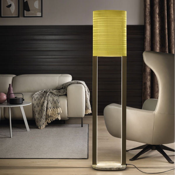 A luxurious Masiero Ebe Floor Lamp adds artistic expression to a living room with decorative lights.
