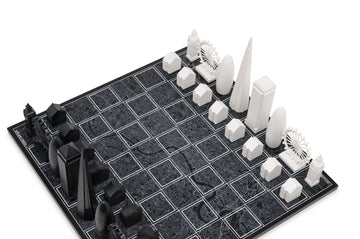 A black and white Skyline chess board set with London architecture.