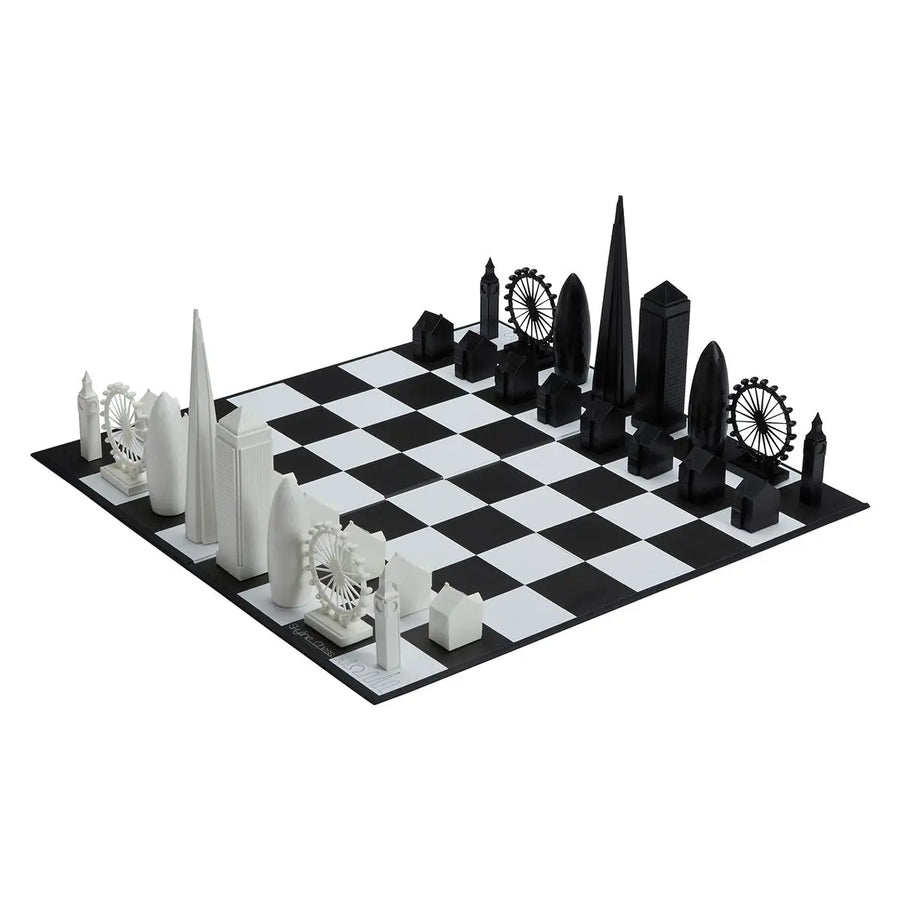 A black and white Skyline Chess Acrylic New York Folding Board with London buildings featuring skyscraper architecture.