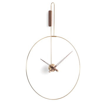 An elegant Nomon wall clock with a circular shape, perfect for a modern living area.
