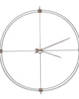 A Nomon wall clock with a circular shape on a white background, perfect for interior decoration.