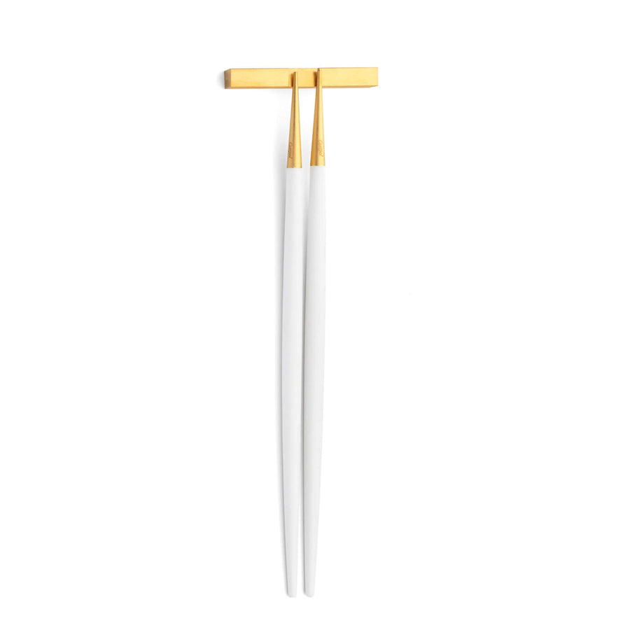 Cutipol Goa white matt gold finish, black resin handles, and minimalist design for a luxurious dining experience - on a white background  chopsticks with servers