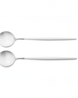 Cutipol Goa white matt stainless steel finish, black resin handles, and minimalist design for a luxurious dining experience - on a white background 2pcs salad servers