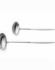 Cutipol Goa white matt stainless steel finish, black resin handles, and minimalist design for a luxurious dining experience - on a white background 2pcs spoon servers