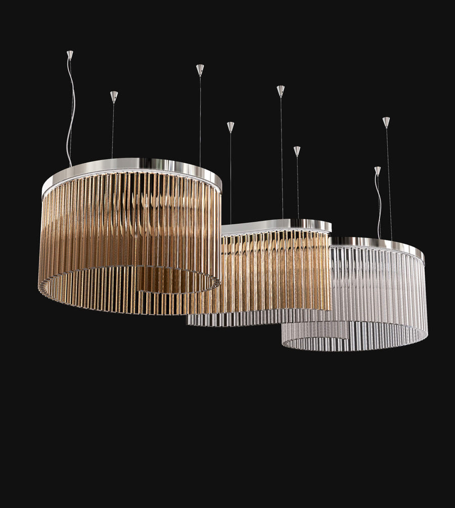 A close view with teak and clear glass in spiral shape. Discover the Carmen collection by Italamp – Italian Murano glass lighting in clear, smoke, and teak finishes. Elegant designs for luxurious interiors.