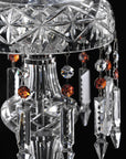 Chanel Collection chandelier by Italamp with carved crystal, chrome-finished metal, and dove fabric diffusers, showcasing Italian luxury and timeless design. Detailing of Chanel crystals in clear and red colours