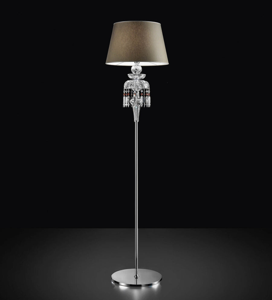 Chanel Collection chandelier by Italamp with carved crystal, chrome-finished metal, and dove fabric diffusers, showcasing Italian luxury and timeless design. A Chanel floor lamp with taupe finish fabric diffuser on a black background