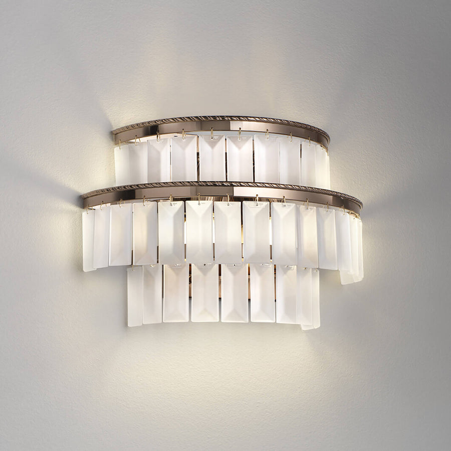 Charles Collection suspension lamp by Italamp featuring gold nickel finish, satin glass elements, and leather accents, epitomising Italian luxury lighting design. A Charles wall sconce on a white background. 