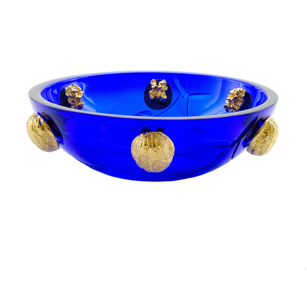 A stunning Mario Cioni Purpose Blue Gold Walnut Crystal Bowl with deep blue crystal, gold walnut accents, and intricate engraved leaf patterns, handcrafted in Italy. A closeup view