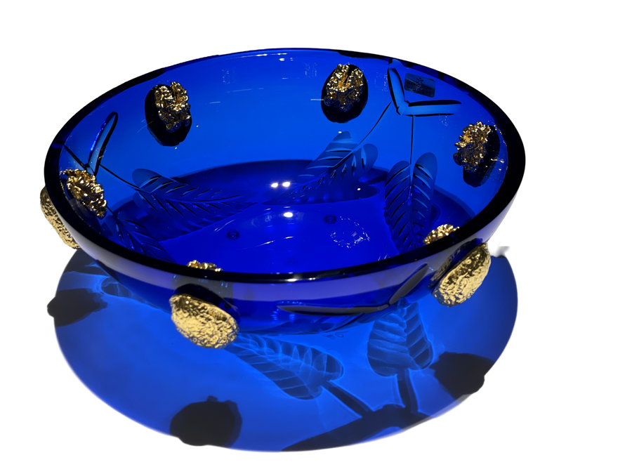 A stunning Mario Cioni Purpose Blue Gold Walnut Crystal Bowl with deep blue crystal, gold walnut accents, and intricate engraved leaf patterns, handcrafted in Italy.