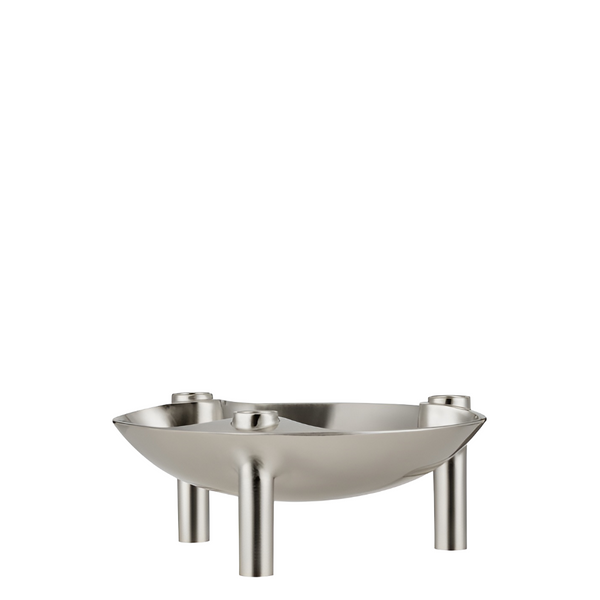 A modern chrome finish bowl with three cylindrical legs as candle holder, photographed on a seamless white background.