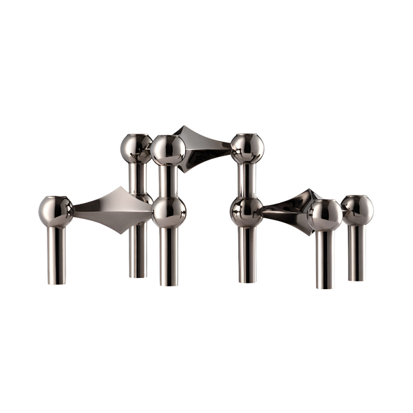 A set of polished chrome candle stand on a solid white background from Stoff Nagel available at Spacio in India. 