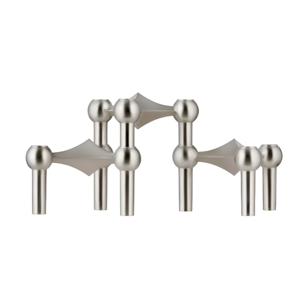 Brushed chrome candle stand on a white background from Stoff Nagel available at Spacio in India. 