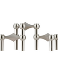 Brushed chrome candle stand on a white background from Stoff Nagel available at Spacio in India. 