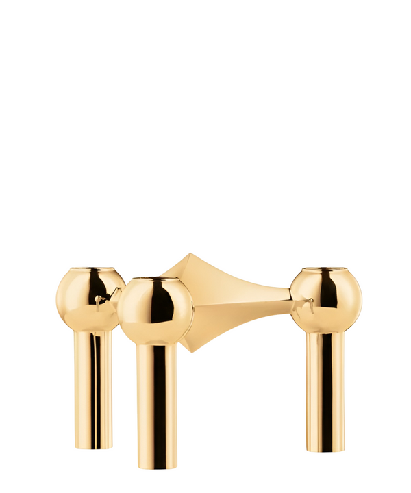 A polished gold three-hole candle stand shown against a solid white background.