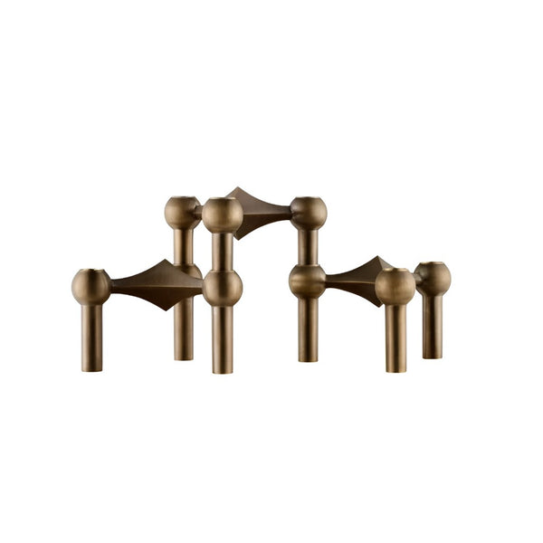 A set of module 3 pc set  bronze-finished candle holders from Stoff Nagel arranged symmetrically on a plain white background, available at Spacio in India. 