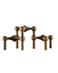 A set of module 3 pc set  bronze-finished candle holders from Stoff Nagel arranged symmetrically on a plain white background, available at Spacio in India. 