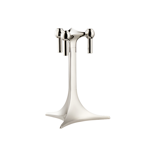 A polished silver metal candle holder stand with three vertical candle sleeves and a wide, sculptural base, shown on a solid white background.