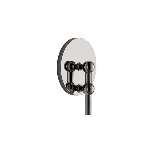 A modern wall-mounted candle holder with a polished dark metallic finish, featuring a round backplate and a sleek vertical bar with decorative spherical accents.
