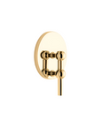 A polished gold wall-mounted candle holder with a circular backplate and spherical decorative joints, shown against a solid white background.