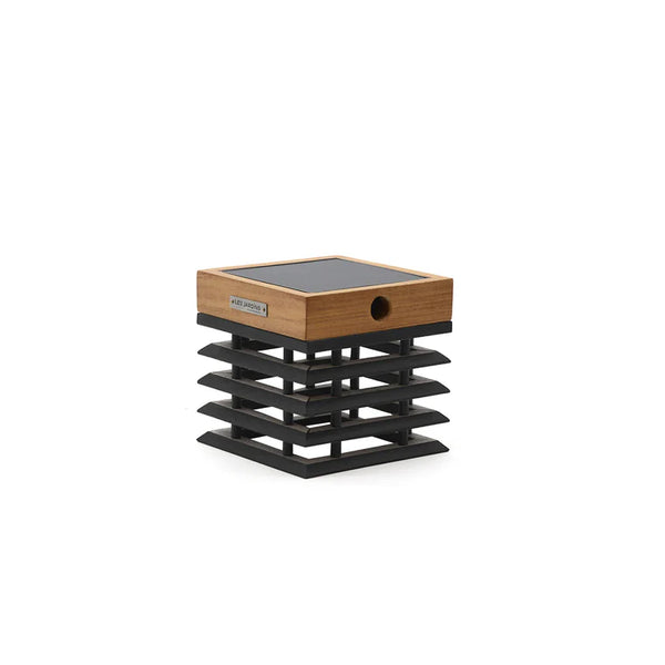 Wooden and black solar wall light on a white background by Les Jardins available at Spacio in India. 
