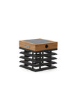 Wooden and black solar wall light on a white background by Les Jardins available at Spacio in India. 
